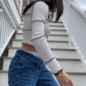 White long sleeve with black stitching